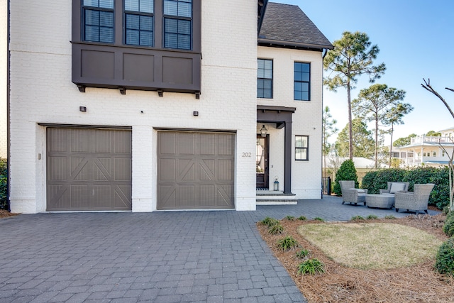 view of front of property featuring a garage