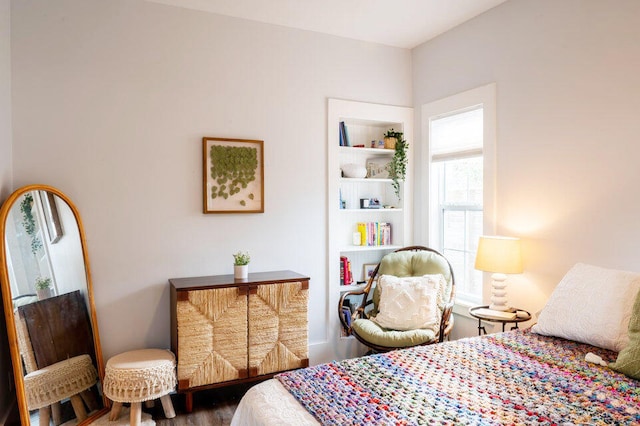 bedroom featuring dark wood-type flooring