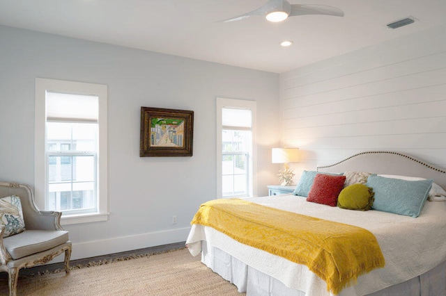 bedroom featuring ceiling fan and light wood-type flooring