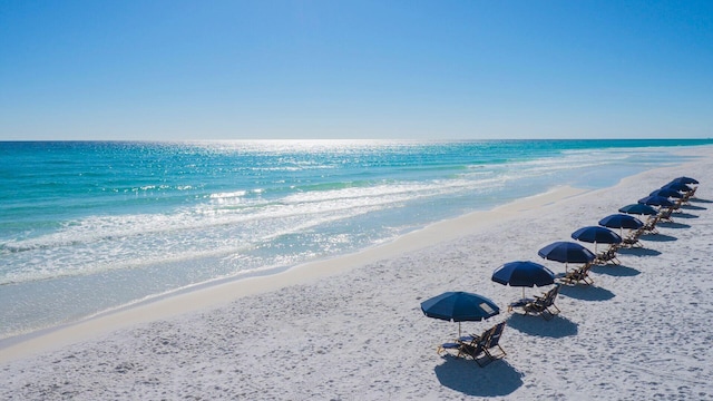 view of water feature with a beach view