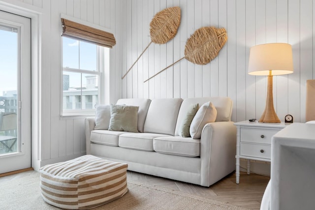 living room with plenty of natural light and light parquet flooring