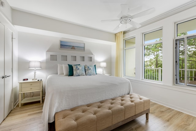 bedroom featuring light hardwood / wood-style flooring and ceiling fan