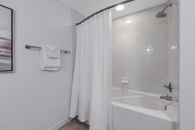 bathroom featuring shower / tub combo and tile floors