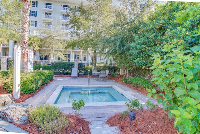 view of swimming pool featuring a patio