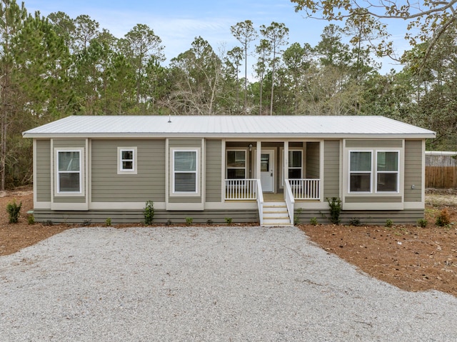 view of front of property featuring covered porch