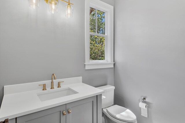 112 S Magnolia Beach Way, Santa Rosa Beach, FL 32459 - half bathroom with toilet and vanity