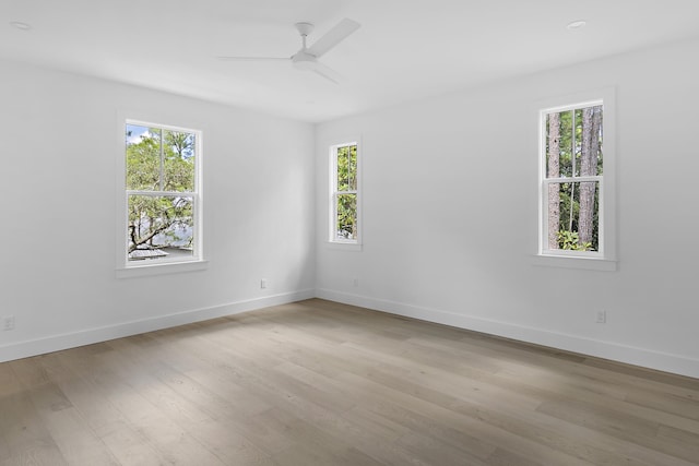 112 S Magnolia Beach Way, Santa Rosa Beach, FL 32459 - empty room with healthy amount of natural light, a ceiling fan, and baseboards