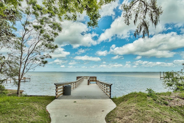 view of dock with a water view