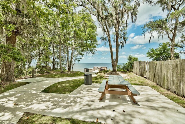 112 S Magnolia Beach Way, Santa Rosa Beach, FL 32459 - view of community featuring a water view and a patio