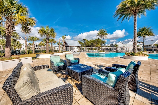 view of pool featuring a patio