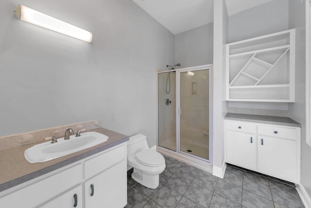 bathroom with vanity, an enclosed shower, tile patterned flooring, and toilet