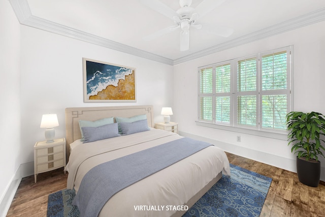 bedroom featuring crown molding, ceiling fan, and wood-type flooring