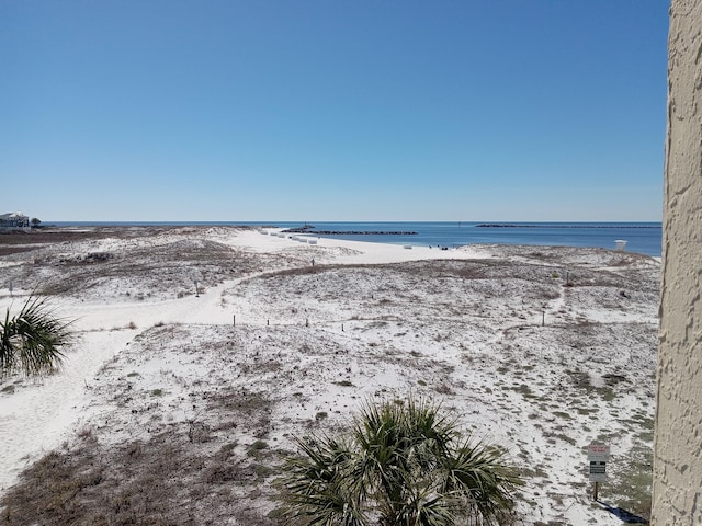 property view of water featuring a beach view