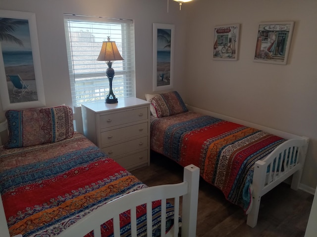 bedroom featuring dark hardwood / wood-style floors