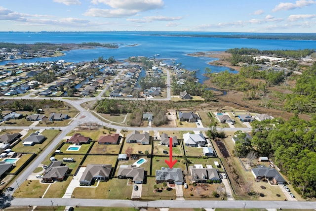 drone / aerial view with a water view