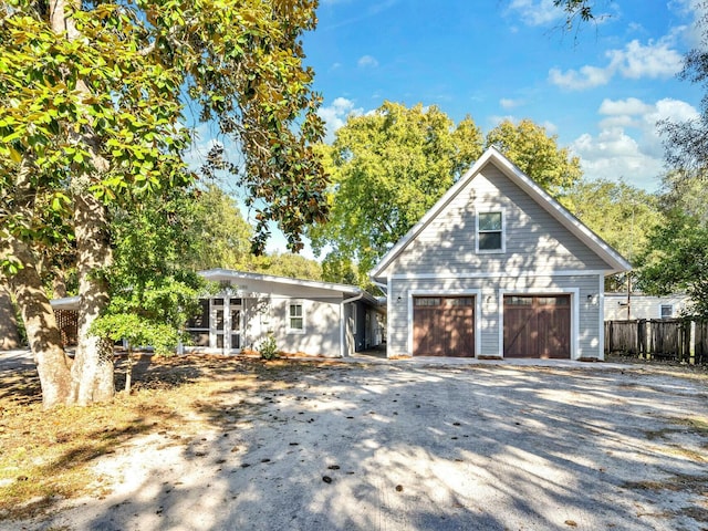 view of front of home with a garage