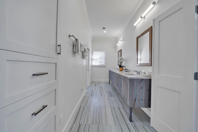 bathroom with vanity, crown molding, and tile flooring