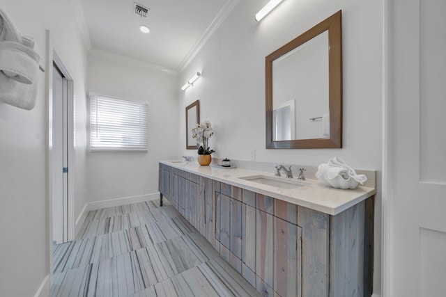 bathroom with crown molding, tile floors, and double sink vanity