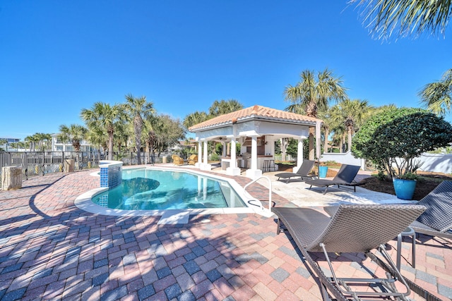 view of pool with a gazebo and a patio