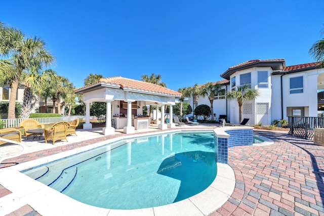 view of pool featuring a patio area and a gazebo