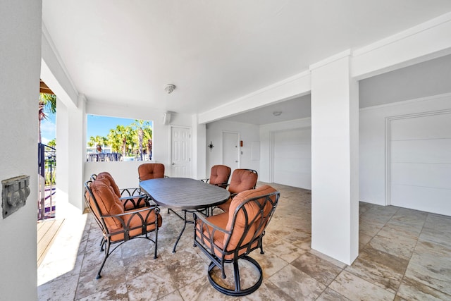 dining area with light tile floors