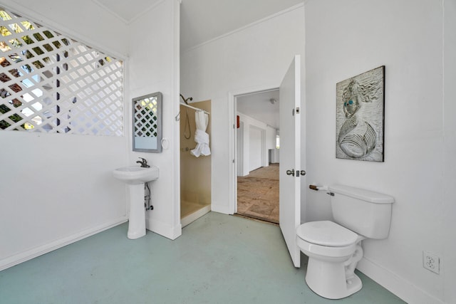 bathroom featuring toilet and sink