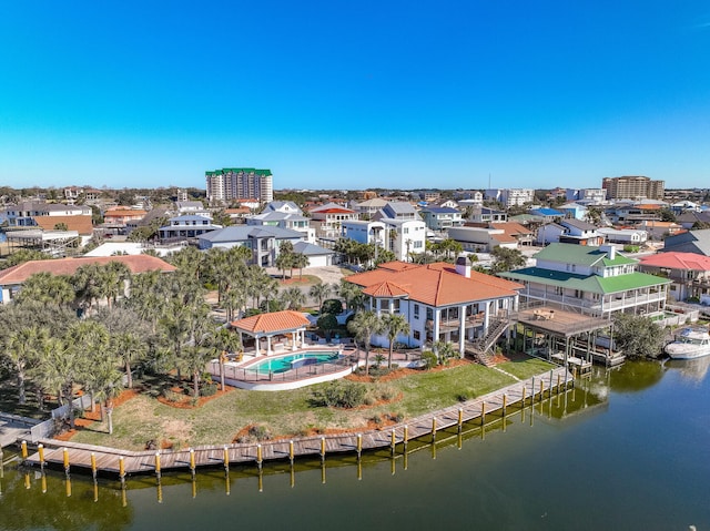 birds eye view of property featuring a water view