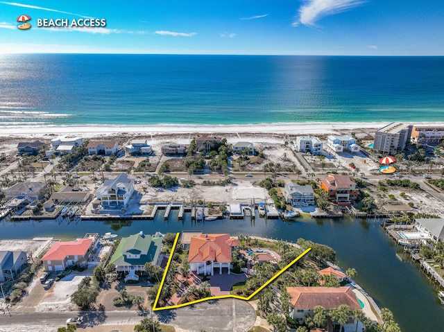 aerial view with a view of the beach and a water view