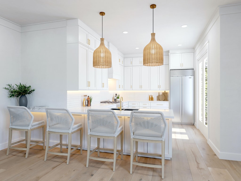 kitchen featuring light hardwood / wood-style floors, white cabinets, and built in fridge