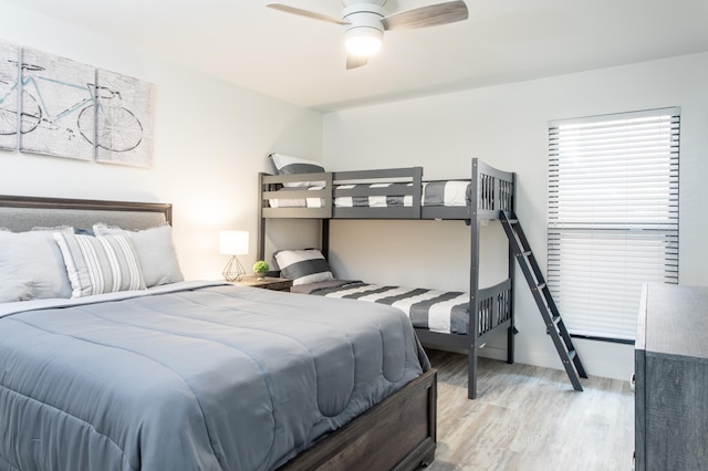 bedroom featuring ceiling fan and light wood-type flooring