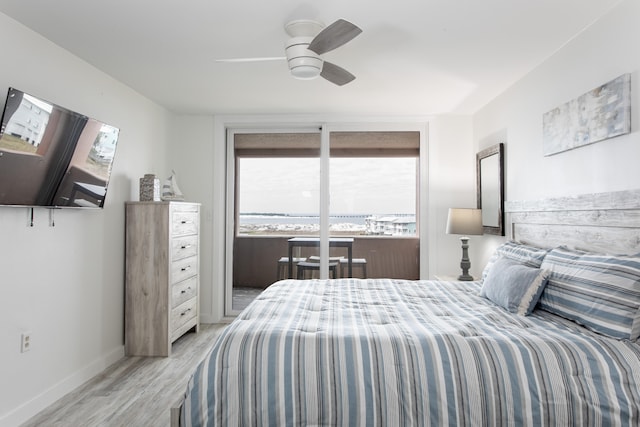 bedroom featuring light hardwood / wood-style flooring and ceiling fan