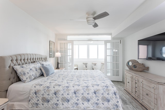 bedroom with ceiling fan and light wood-type flooring