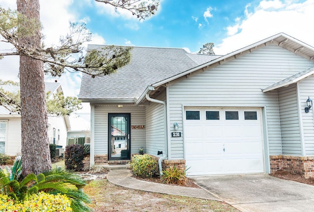 view of front of property featuring a garage