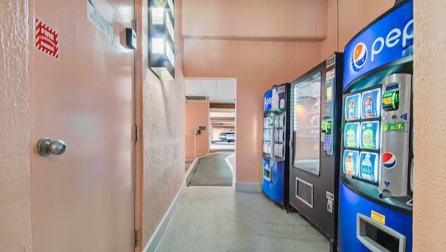 hallway featuring baseboards