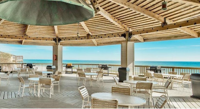 view of patio featuring a water view and a gazebo