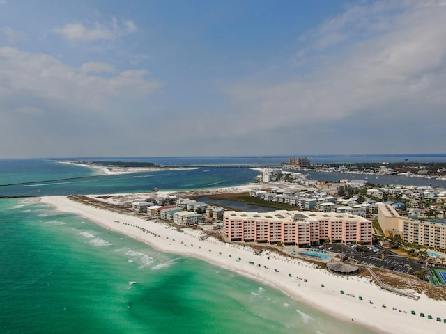 aerial view with a water view, a beach view, and a city view