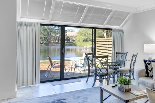 doorway featuring light tile patterned floors, vaulted ceiling with beams, a water view, and floor to ceiling windows