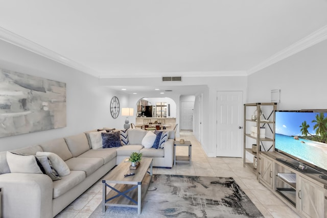 tiled living room with ornamental molding