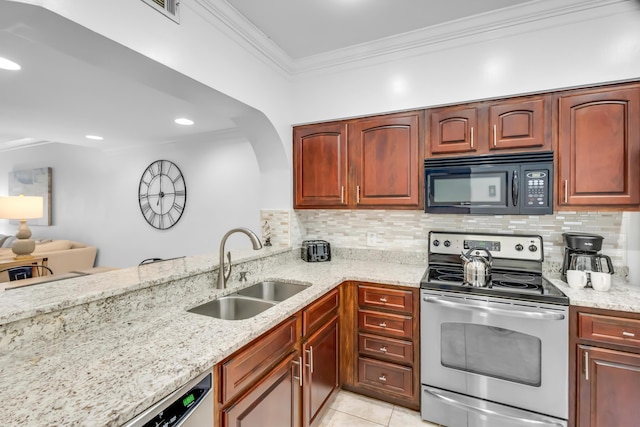 kitchen with sink, light stone counters, crown molding, light tile patterned flooring, and appliances with stainless steel finishes