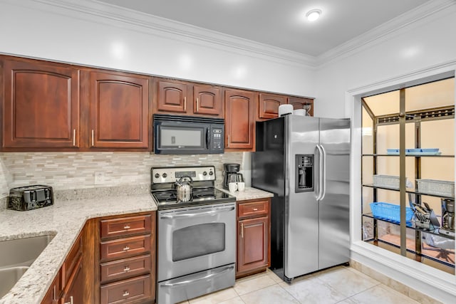 kitchen featuring decorative backsplash, light tile patterned floors, ornamental molding, appliances with stainless steel finishes, and light stone counters