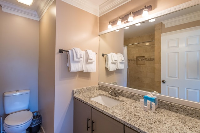 bathroom featuring a shower with shower curtain, vanity, toilet, and crown molding