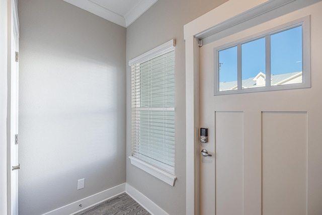 doorway to outside with wood-type flooring