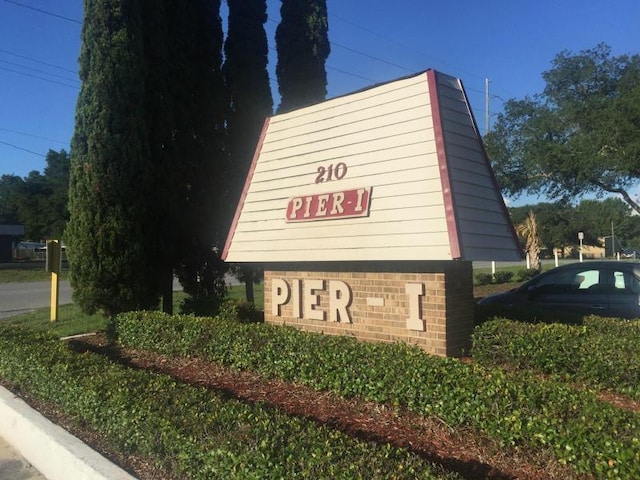 view of community sign