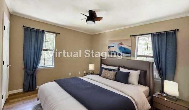 bedroom featuring crown molding and hardwood / wood-style floors