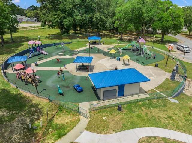 view of community with a playground and a yard