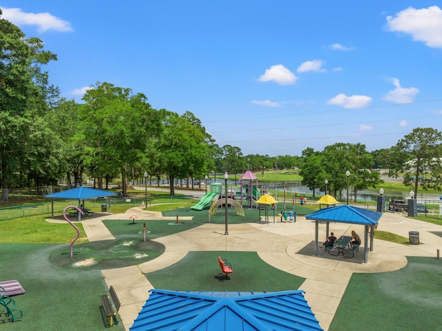 view of property's community featuring a playground