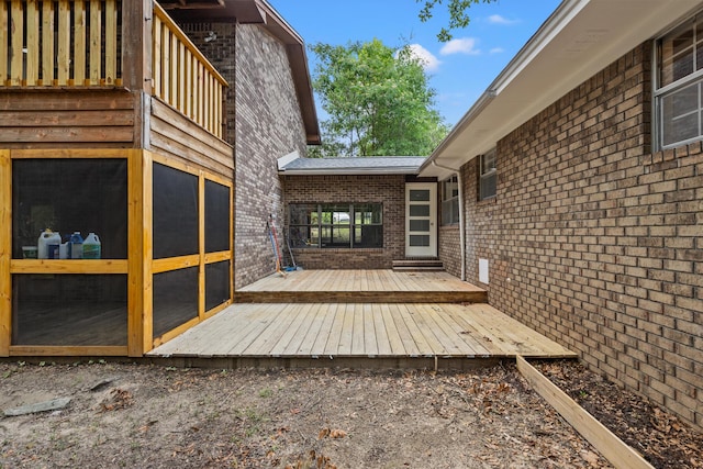 deck with a sunroom