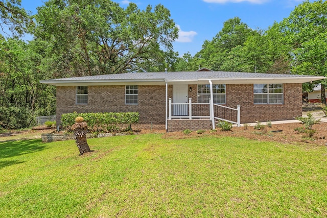 single story home with a front yard