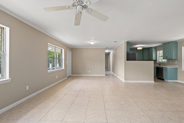 unfurnished living room with sink, light tile patterned floors, plenty of natural light, and ornamental molding