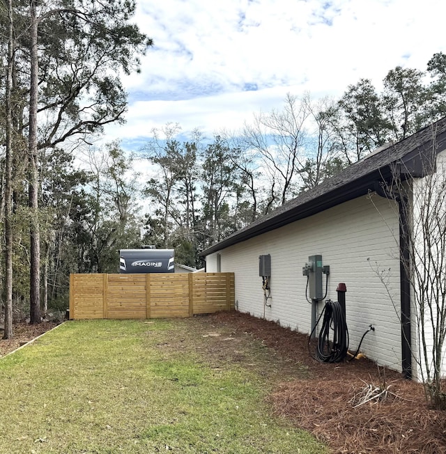 view of yard with fence